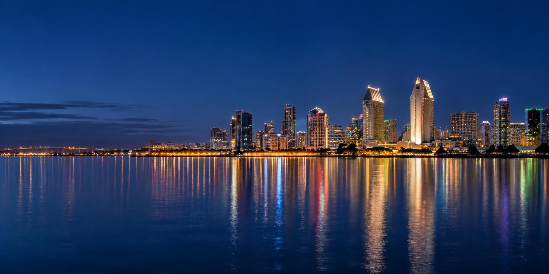 San Diego city lights reflected across the bay at night
